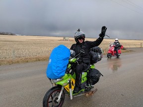 Piotr Glowacki is from Poland and was attempting to ride his 50cc scooter around the world until he was struck from behind by a vehicle 40km out of Calgary. FACE BOOK ORG XMIT: X-EoATwV_qWQSbqljzc7