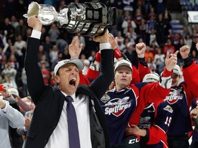 Head coach Rocky Thompson of the Windsor Spitfires celebrates winning the championship game of the Memorial Cup over the Erie Otters 4-3 on May 28, 2017, at the WFCU Centre in Windsor, Ont.