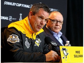 Pittsburgh Penguins coach Mike Sullivan, left, and general manager Jim Rutherford of the Pittsburgh Penguins answer questions in a press conference during Media Day for the 2017 NHL Stanley Cup Final at PPG PAINTS Arena on May 28, 2017 in Pittsburgh, Pennsylvania.