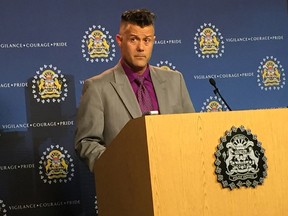 Staff Sgt. Bruce Walker with the Calgary police sex crimes unit speaks at a news conference Thursday.