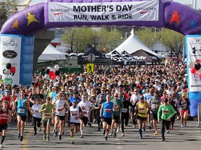 Runners race off the start at the Sport Chek Mother's Day Run and Walk at Chinook Centre on Sunday May 14, 2017. The event supports neonatal units in Calgary as well as Jumpstart for Kids. Gavin Young/Postmedia Network