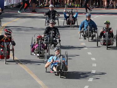Wheel chair racers speed off the start at the Sport Chek Mother's Day Run and Walk at Chinook Centre on Sunday May 14, 2017. The event supports neonatal units in Calgary as well as Jumpstart for Kids.