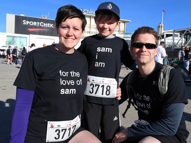 Sam Connolly, 8, stands with his mom Mandy and Dad Shaun before the Sport Chek Mother's Day Run and Walk at Chinook Centre on Sunday May 14, 2017. The Connollys credit Calgary's neonatal units for keeping Sam alive in the first few weeks of his life. The Sport Chek event supports neonatal units in Calgary as well as Jumpstart for Kids.