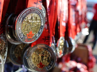 Finisher medals await runners at the end of the Scotiabank Calgary Marathon on Sunday May 28, 2017.