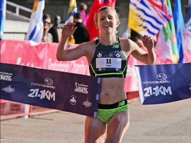 Rachel Hannah crosses the line in first place in the women's division in the half marathon event at the Scotiabank Calgary Marathon on Sunday May 28, 2017.