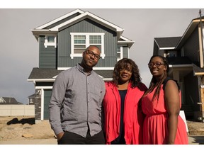 Caroline Joseph, her son Jameel, and  daughter Jenelle, at their new home by Shane Homes in Redstone.