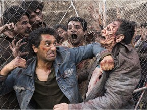 Cliff Curtis and zombies in a scene from Season 3 of Fear the Walking Dead.