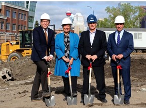 Councillor Gian-Carlos Carra, owners of the land Penny and Chris Stathonikos, and Brian Kernick, president of Greenview Developments turn shovels for the start of construction at Avli on Atlantic.