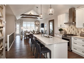 The kitchen in the Savannah show home by Calbridge Homes in Fireside y La Vita Land.