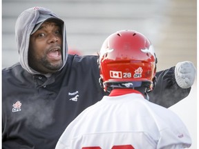 Calgary Stampeders defensive co-ordinator DeVone Claybrooks offers some guidance during practice at McMahon Stadium. (Lyle Aspinall)
