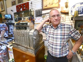 Rob Kroll, from Hole in the Wall antiques, poses in High River, south of Calgary on Wednesday May 3, 2017. Jim Wells//Postmedia
