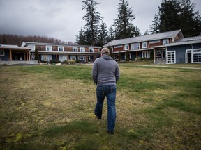 FILE PHOTO: Firefighter Joel McNair, of Saskatoon, Sask., walks the grounds at the Sunshine Coast Health Centre in Powell River, B.C., on Thursday March 16, 2017.