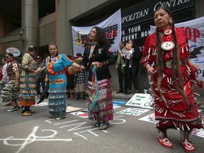 Jingle dancers during a rally in support of the people of Standing Rock and their ongoing struggle with Enbridge, Inc. outside of the Metropolitan centre in Calgary on Thursday May 11, 2017. Leah Hennel/Postmedia