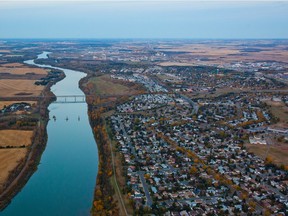 The North Saskatchewan River runs past Fort Saskatchewan, right, with Alberta's Industrial Heartland, in the background.