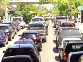 Jordan Tettensor shot this video of traffic at a standstill downtown on Sunday May 28, 2016 as Calgary marathoners raced by on 9th Avenue. Tettensor was stuck in the traffic jam for more than an hour and missed his grandfather’s funeral as a result. /contributed by Jordan Tettensor
