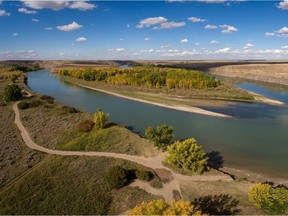 The silty waters of the Oldman River mix with the clear waters of the Bow to form the South Saskatchewan River at the Forks near Grassy Lake, Ab., on Tuesday September 20, 2016. Mike Drew/Postmedia