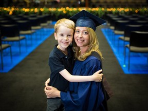 Mount Royal University grad Robyn Bell was photographed with her six year-old son Aiden at the university on Wednesday May 31, 2017. Gavin Young/Postmedia Network