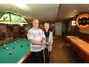Clarke and Sheryl Pinnock enjoy a game of pool in the games room at Sanderson Ridge.