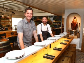 Nathaniel Krieger, owner/operator, left, and Kai Salkimaki, Executive Chef pose in Ox Bar deTapas on 17 Avenue S.W. in Calgary.