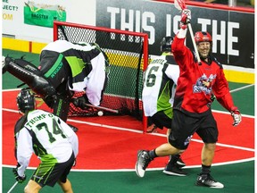 The Calgary Roughnecks' Tyler Digby celebrates scoring on Saskatchewan Rush goalie Aaron Bold during National Lacrosse League action in Calgary on Saturday April 29, 2017.