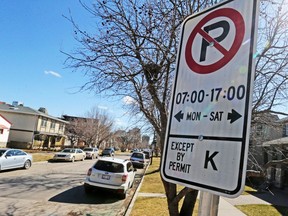 A residential parking permit sign in Kensington was photographed on Sunday April 16, 2017.  City council will consider this week a strategy that would allow photo enforcement and electronic permitting for parking in residential neighbourhoods. Gavin Young/Postmedia Network