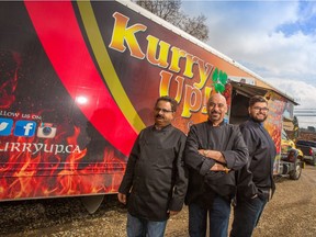 Jassie Bakshi stands with his son Sunny, right and chef Gary Singh,left in front of their Kurry Up! food truck.