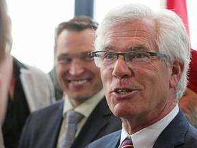 Jim Carr, Canada's Minister of Natural Resources, speaks with media in Calgary following the announcement of $26 million in federal and provincial funding for oil and gas clean tech projects on Thursday May 11, 2017. Gavin Young/Postmedia Network