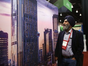 Guldeep Singh Sahni, from India, checks out the booths during the Rendez-vous Canada tourism conference at the BMO Centre in Calgary on Wednesday May 10, 2017. Leah Hennel/Postmedia