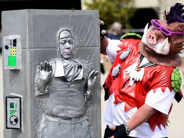 Han Solo in carbonite meets a Ninja Turtle bad guy, Bebop. Costumes, music and art filled the Stampede grounds as The Calgary Comic and Entertainment Expo ran for it's third day in Calgary, Alta., on April 30, 2017. Ryan McLeod/Postmedia Network