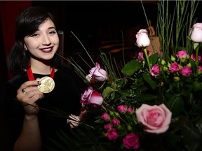 Isabella Perron, a viola player from Bishop Carroll High School, is the winner of the Calgary Performing Arts Festival's Rose Bowl as overall winner of the festival at the Stars of the Festival Concert at Webber Academy in SW Calgary, Alta., on May 7, 2017. The Rose Bowl win comes with a $5,000 scholarship, which Perron said she plans to use to explore and learn more about the world through travel. Ryan McLeod/Postmedia Network