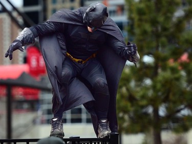 Batman thought about leaping from this railing, but soon realized the safer thing would be to step down. Costumes, music and art filled the Stampede grounds as The Calgary Comic and Entertainment Expo ran for it's third day in Calgary, Alta., on April 30, 2017. Ryan McLeod/Postmedia Network
