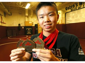Rundle College Grade 12 student Jordan Wong has been busy this year winning wrestling championships, including city and provincial high-school titles as well as a number of national titles, which he had on display on Monday, May 8, 2017. (Darren Makowichuk)