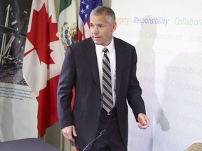 TransCanada Corp. president and CEO Russ Girling enters a press conference after the company's annual meeting in Calgary in this file photo.