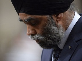 Defence Minister Harjit Sajjan bows his head during question period in the House of Commons on Parliament Hill in Ottawa on Tuesday, May 2, 2017.