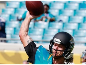 Ricky Stanzi of the Jacksonville Jaguars warms up before a game against the Los Angeles Chargers at EverBank Field on Oct. 20, 2013 in Jacksonville, FL.