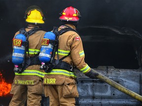 Firefighters put out a fire at a home on Savanna Grove N.E. Tuesday.