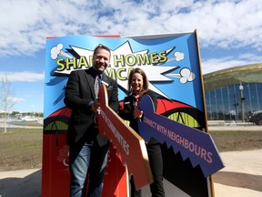 Shane Wenzel, president Shane Homes, left and Shannon Doram, YMCA president and CEO, at the new recreation facility in Calgary, on Friday May 26, 2017,  currently under construction that will be named Shane Homes YMCA in recognition of the Shane Homes' investment in wellness. Leah Hennel/Postmedia