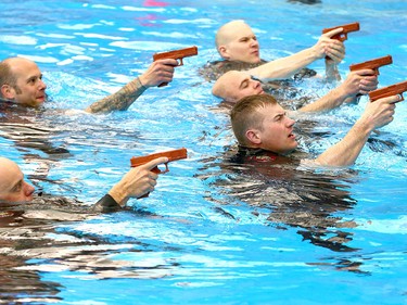 Members of the Calgary Police Service Unit Marine Unit train in the dive tank at Repsol Spaorts Centre in Calgary on Thursday May 11, 2017. The teams' training consists of a number of requirements and includes hand to hand, combat and defensive tactics in, along and under the water. Jim Wells//Postmedia