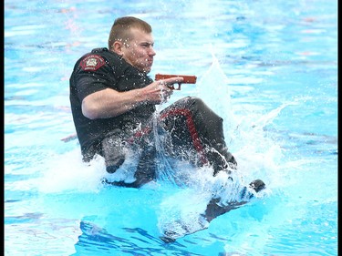 Members of the Calgary police marine unit train in the dive tank at Repsol Sports Centre last Thursday.