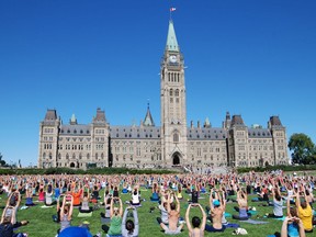 Yoga on Parliament Hill. For Lisa Kadane travel story on Canada 150 in the capital.