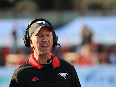 Calgary Stampeders head coach Dave Dickinson yells instructions during CFL action against the Ottawa Redblacks at McMahon Stadium in Calgary on Thursday June 29, 2017. Gavin Young/Postmedia Network