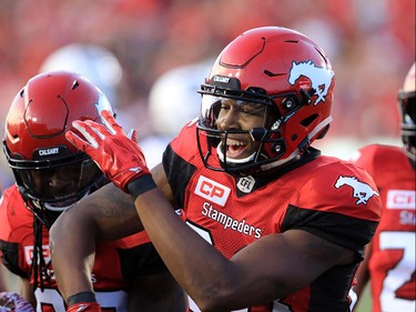 The Calgary Stampeders Marken Michel celebrates his touch down late in the second half during  CFL action against the Ottawa Redblacks at McMahon Stadium in Calgary on Thursday June 29, 2017. Gavin Young/Postmedia Network