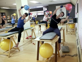 Ballet dancers Garrett Groat, left, and Hayna Gutierrez during a class at the Fitness Table in Calgary.