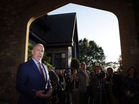 NDP leader and Premier-designate John Horgan makes a brief statement and answers questions from the media after meeting with Lt.-Gov. Judith Guichon at the Government House in Victoria, B.C., on June 29, 2017.
