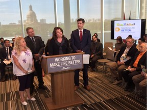 The Alberta government announces a new strategy to give more Albertans the tools they need to find safe and affordable housing and save for their futures. Attending, Lori Sigurdson, Minister of Seniors and Housing; (at podium) Mayor Don Iveson (right).