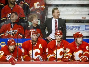 Calgary Flames coach Glen Gulutzan yells to his players during NHL action against the Los Angeles Kings in Calgary, Alta., on Sunday, March 19, 2017.