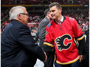 Adam Ruzicka meets with executives after being selected 109th overall by the Calgary Flames during the 2017 NHL Draft at the United Center on June 24, 2017 in Chicago, Illinois.
