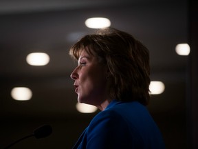 British Columbia Premier Christy Clark addresses Liberal MLAs during a caucus meeting at a hotel in Vancouver