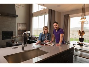 Ben and Kahla Simmonds in the Homes by Avi show home that first impressed them about the Cochrane community of Sunset Ridge