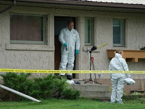 Police investigate at the Blairmore, Alberta home of Terry Blanchette, 27 on Monday September 14, 2015. Police say his death is a homicide and is linked to missing toddler Hailey Dunbar-Blanchette(David Rossiter/Calgary Herald) For City  story by Annalise Klingbeil. ORG XMIT: POS2015091422110359  // 0916 na amber